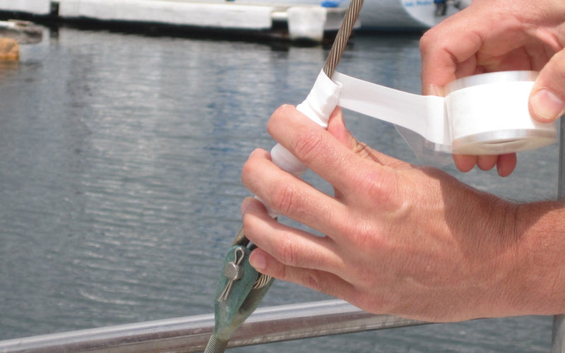 Rescue Tape wrapped around a boat rigging wire at the dock